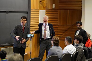Feb 20 meeting Professor Hopfield and presenting award taken by Dan Vahaba Princeton p 96