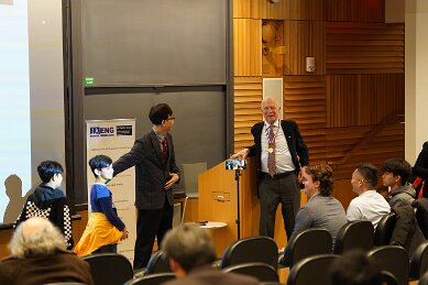 Feb 20 meeting Professor Hopfield and presenting award taken by Dan Vahaba Princeton p 99